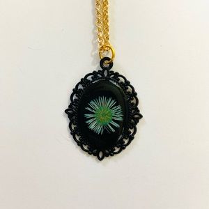 Baby blue aster flower in vintage style bezel